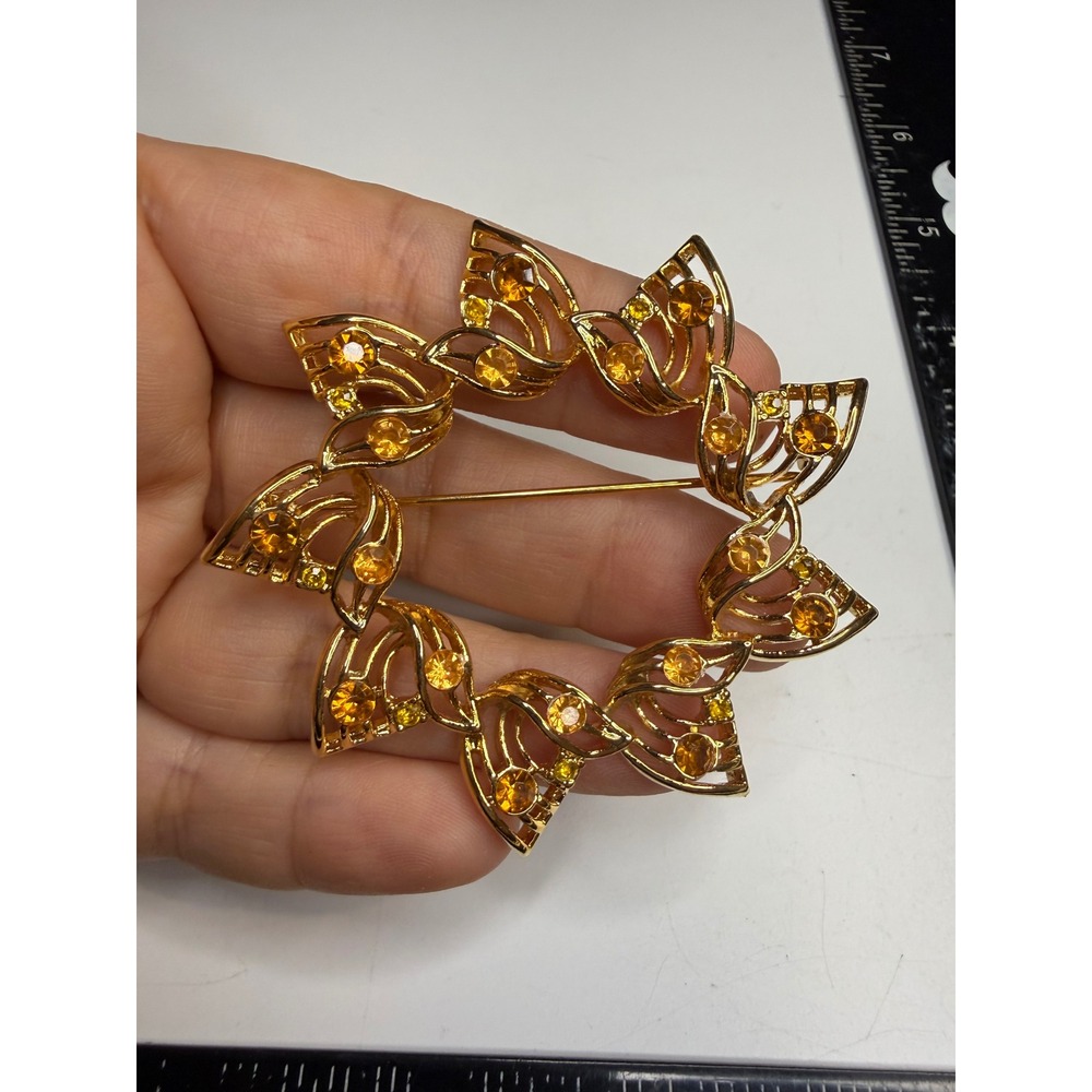 Gold Tone Amber Rhinestone Wreath Brooch Sunburst Filigree Pin 2.25 inch